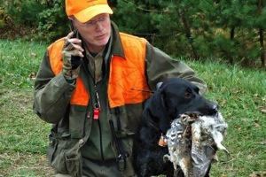 Max holding two Grouse and a Woodcock